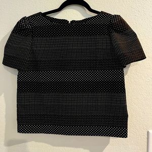 Alice + Olivia top in black with white polka-dots.
